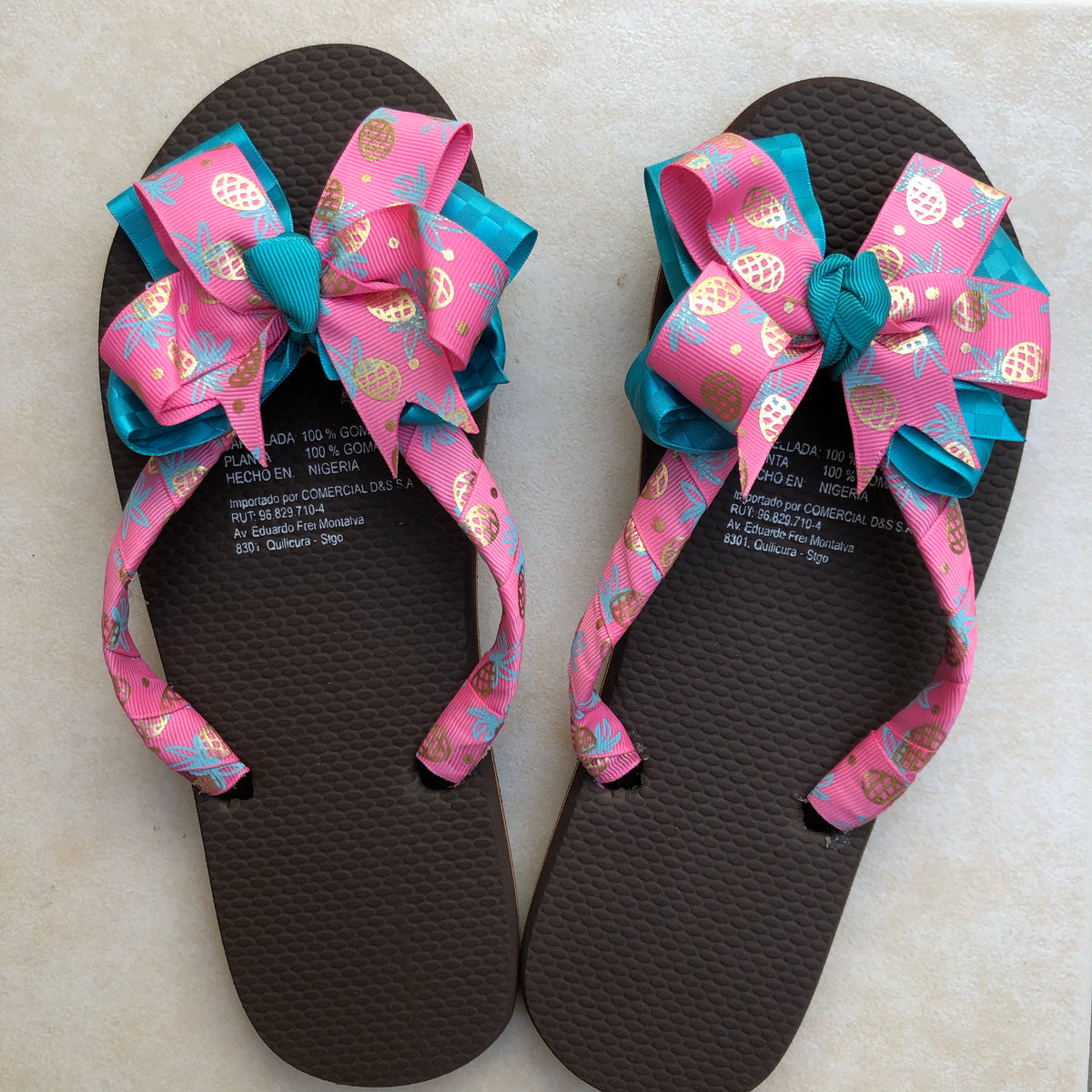 Turquoise & Pink Bow Flip Flops.